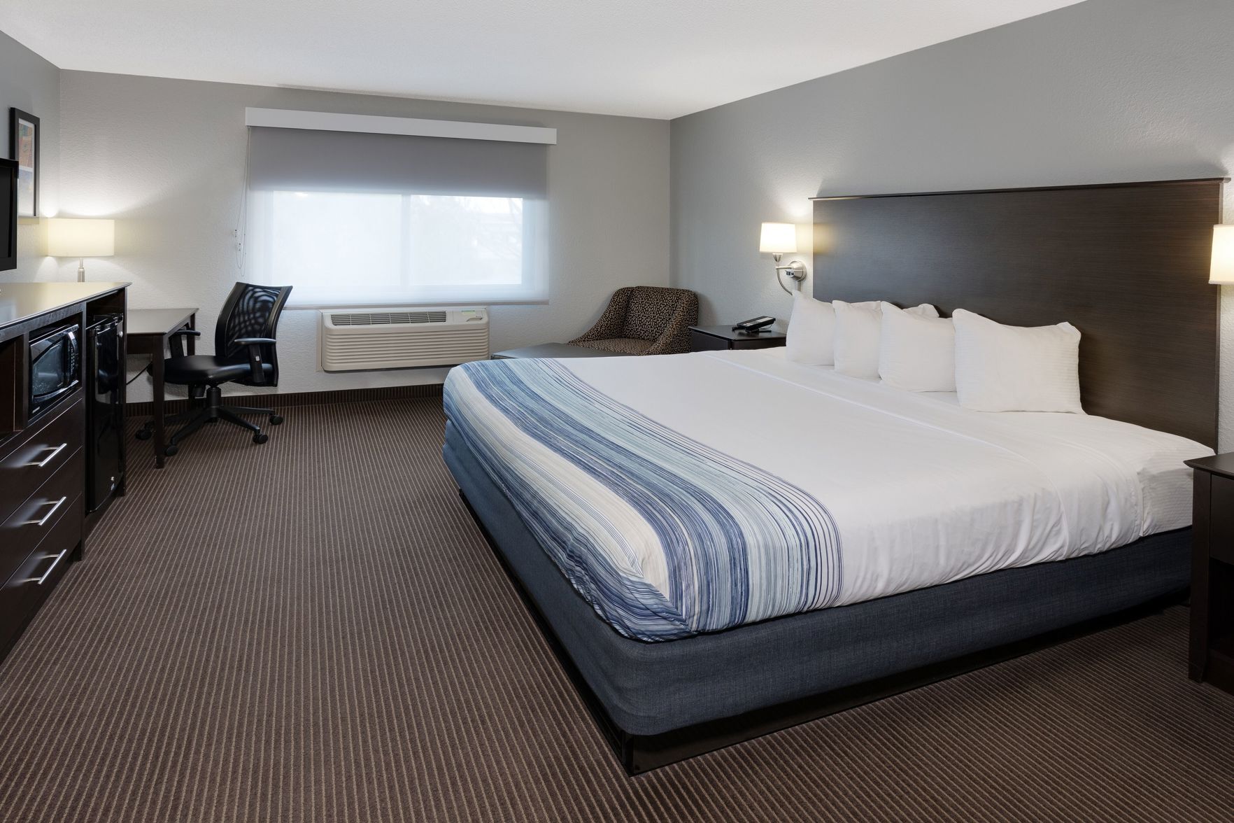 Premium bedding, desk, blackout curtains, soundproofing