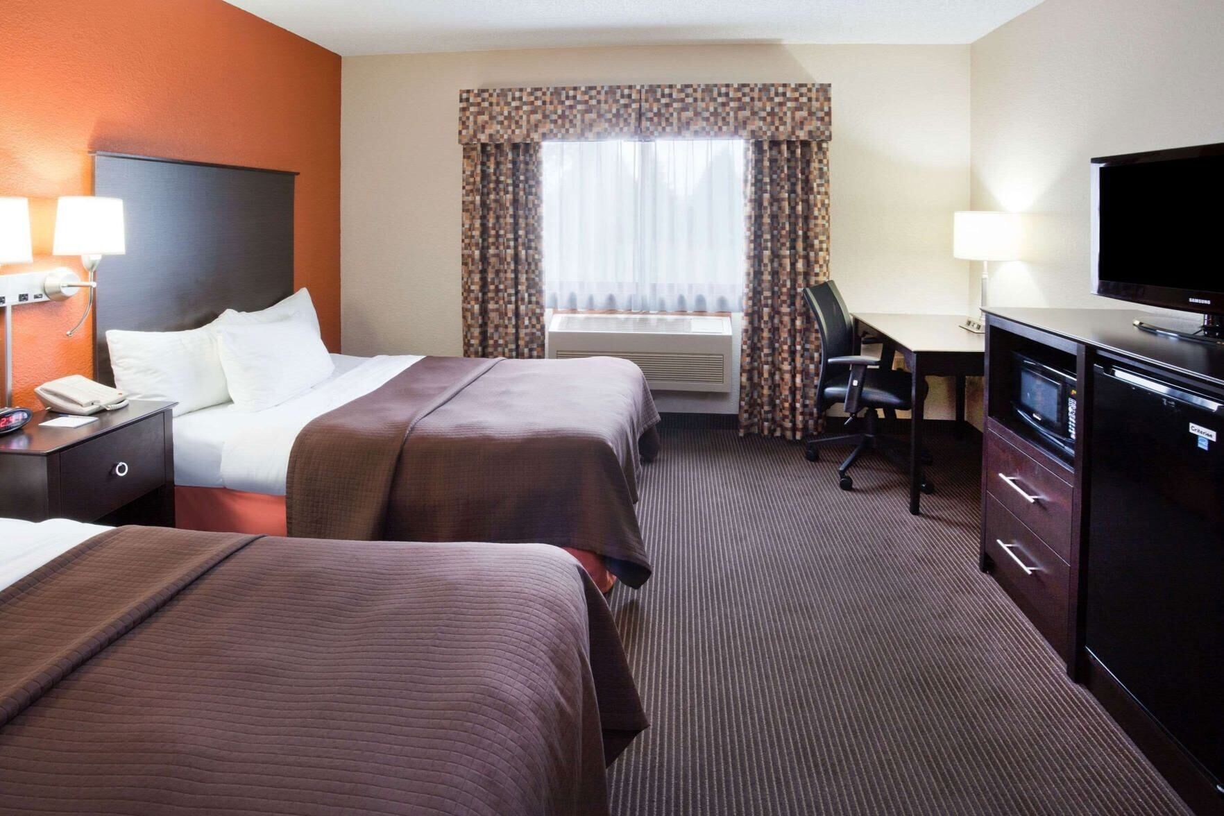 Premium bedding, desk, blackout curtains, soundproofing