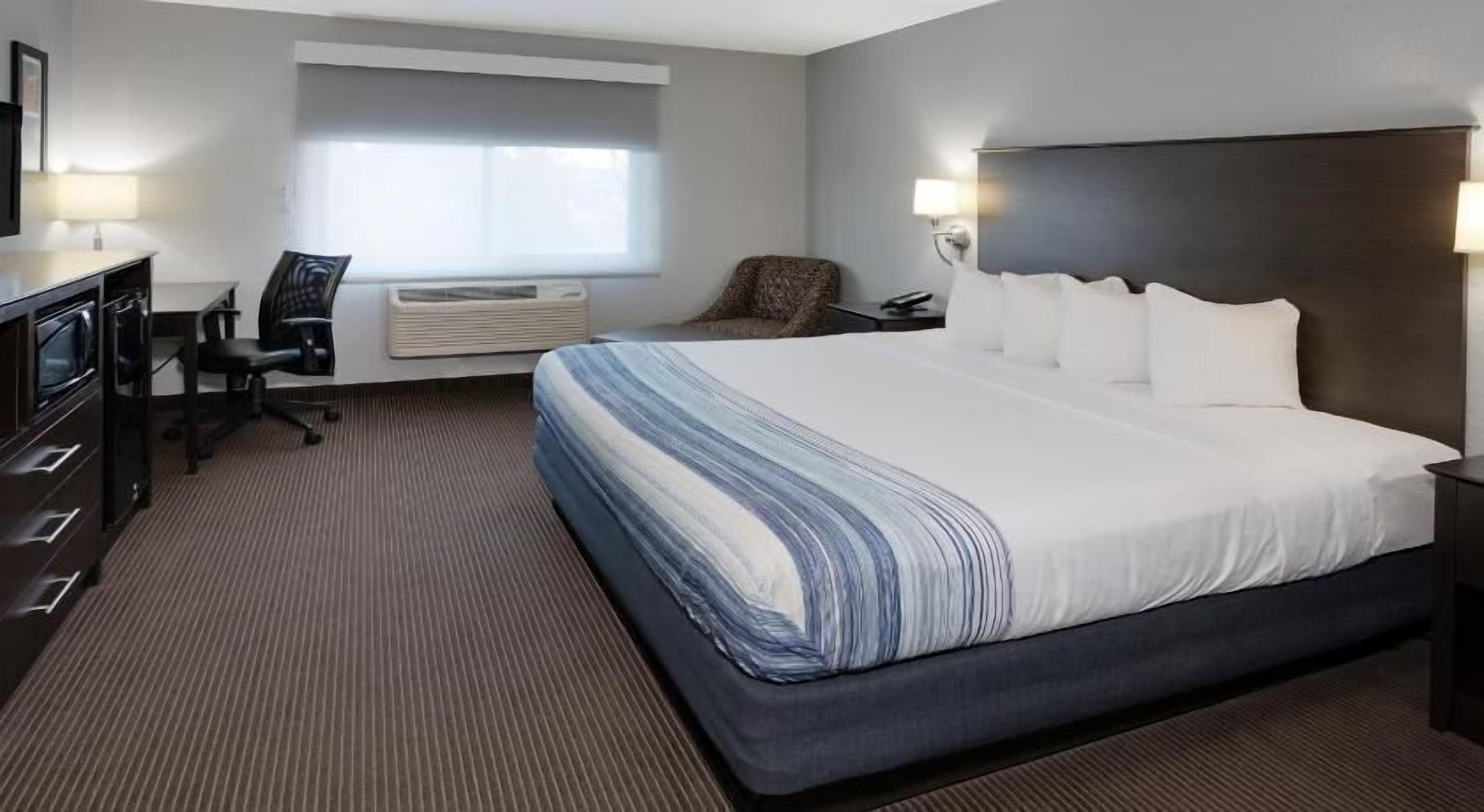 Premium bedding, desk, blackout curtains, soundproofing