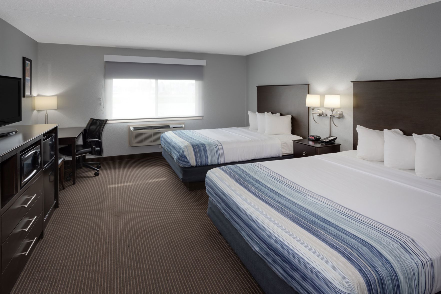 Premium bedding, desk, blackout curtains, soundproofing
