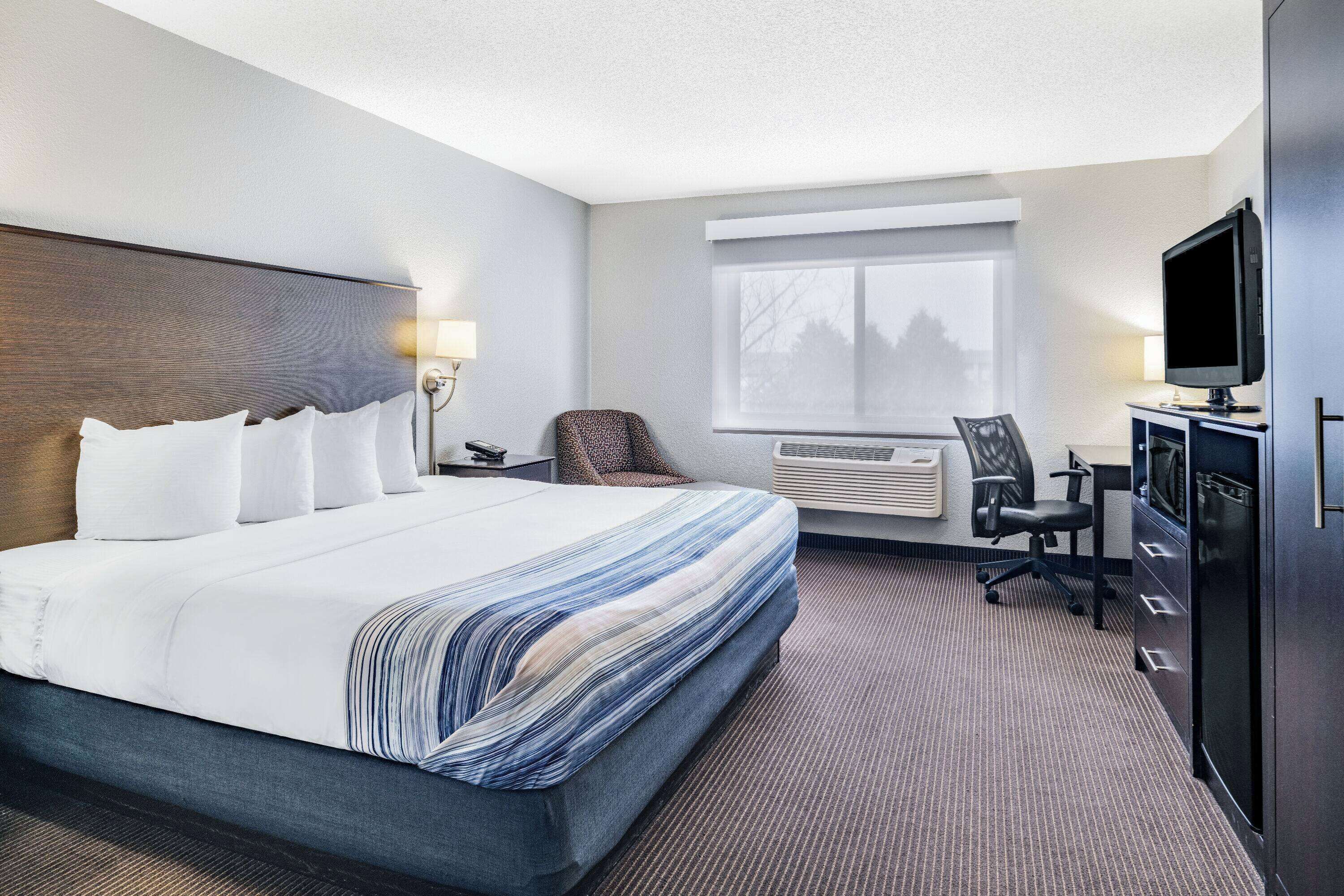 Premium bedding, desk, blackout drapes, soundproofing