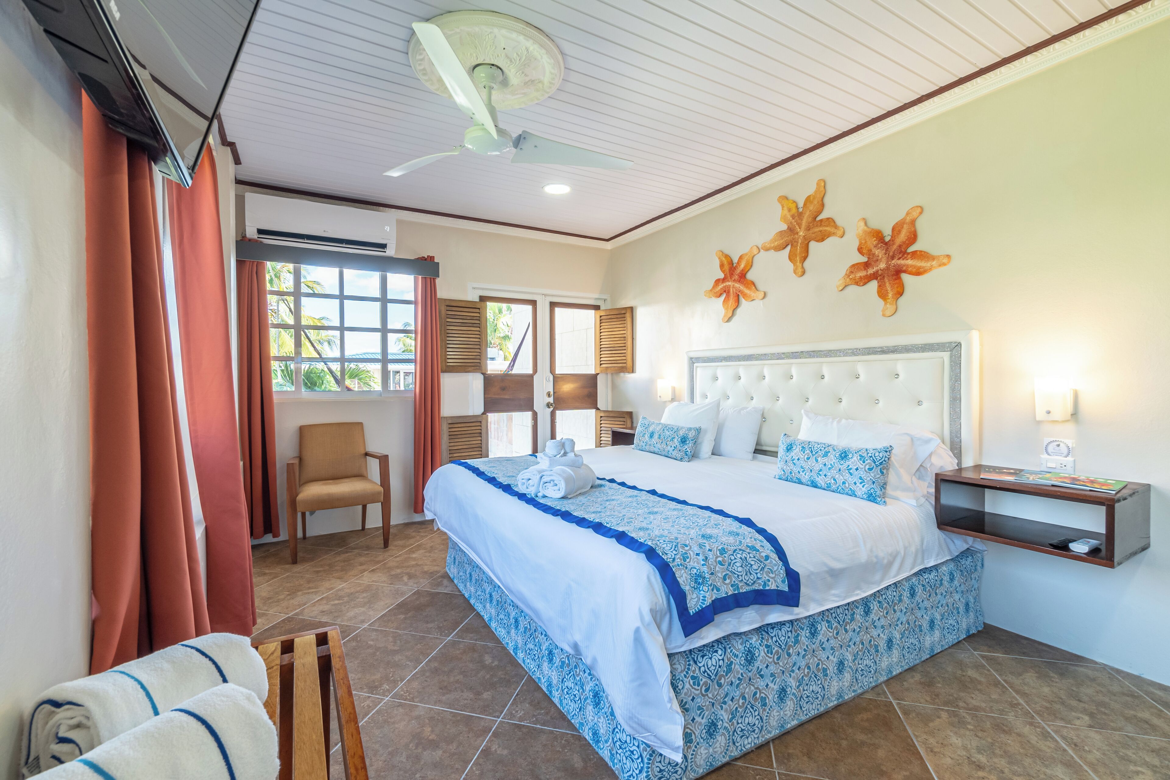 king pool view | in-room safe, blackout curtains, iron/ironing board, rollaway beds