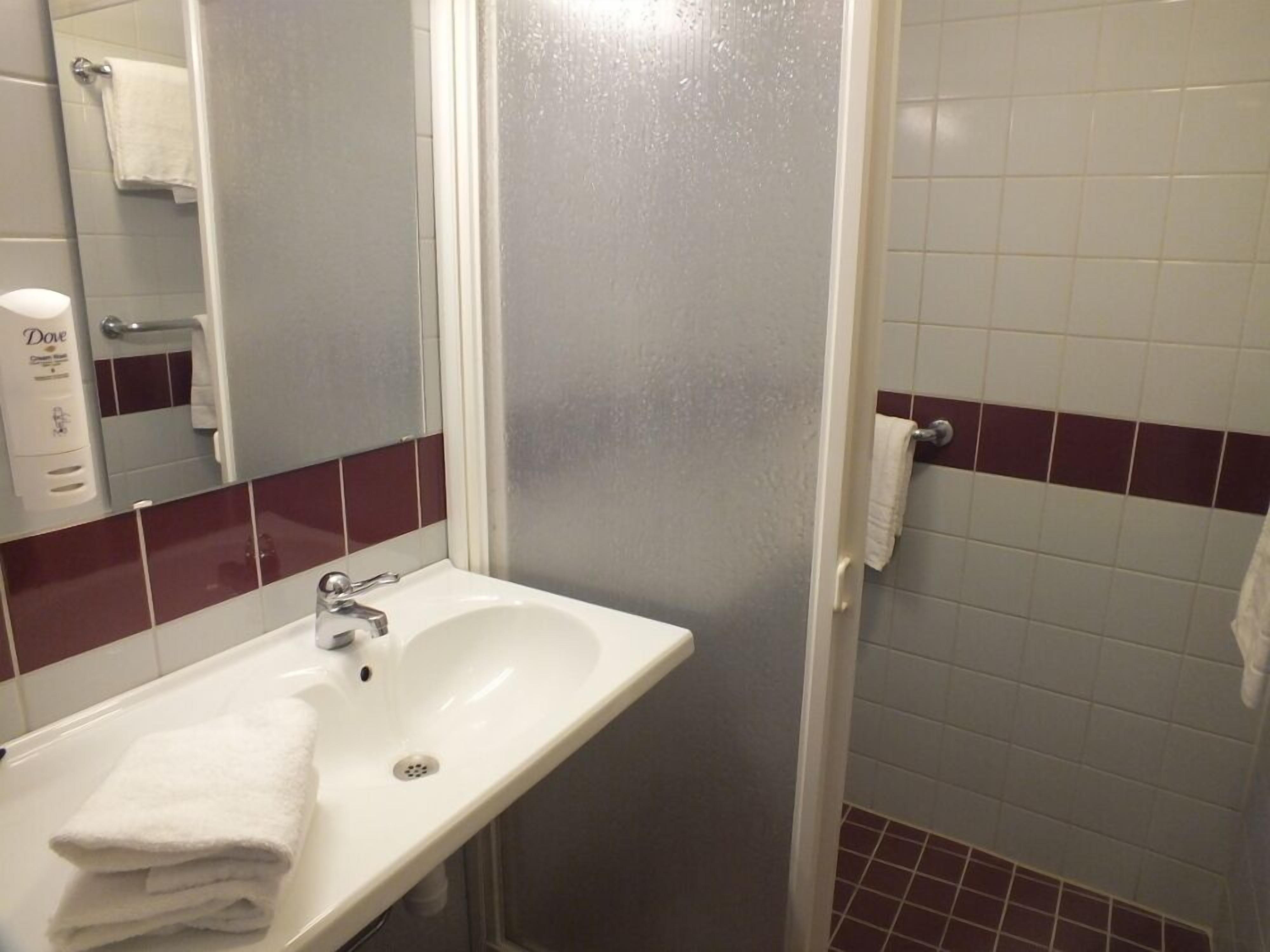 double room, river view | bathroom | shower, free toiletries, hair dryer, towels