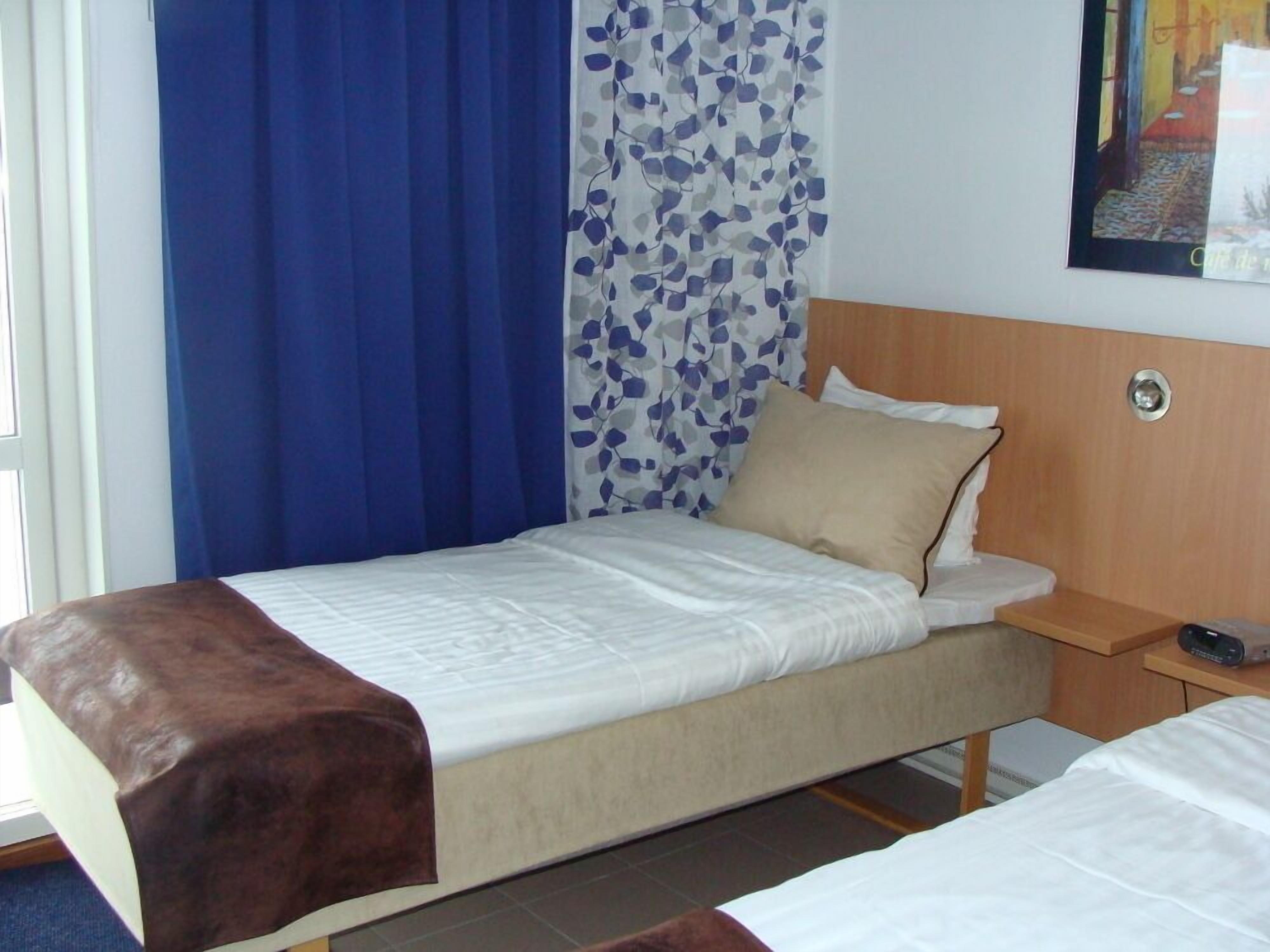 double room, river view | desk, laptop workspace, blackout curtains, iron/ironing board