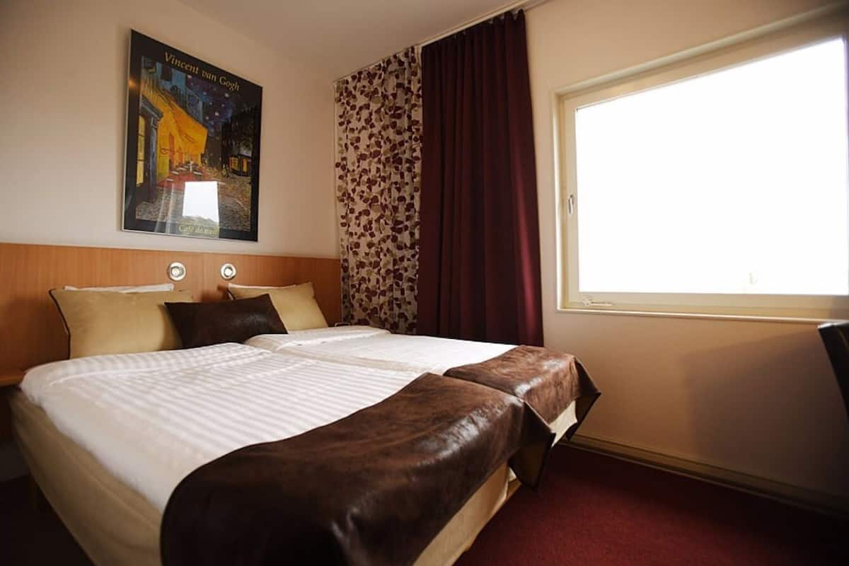 double room, river view | desk, laptop workspace, blackout curtains, iron/ironing board