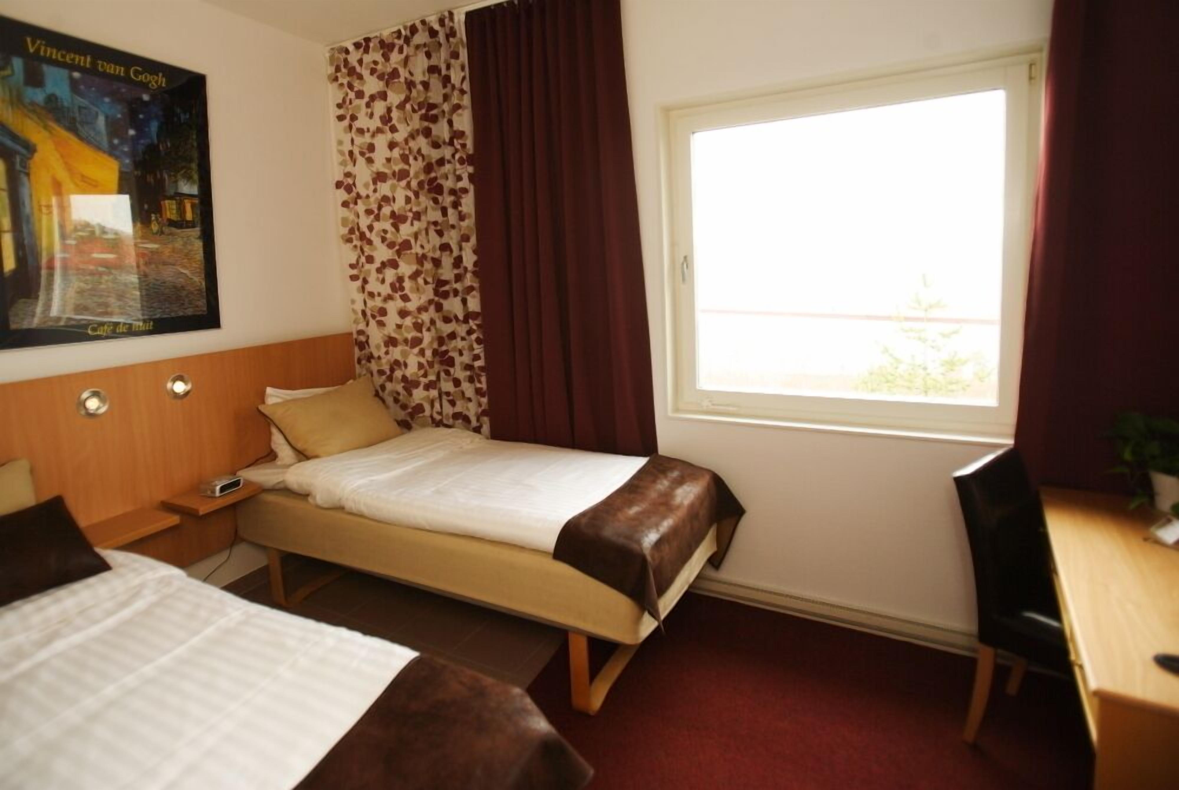 double room, river view | desk, laptop workspace, blackout curtains, iron/ironing board