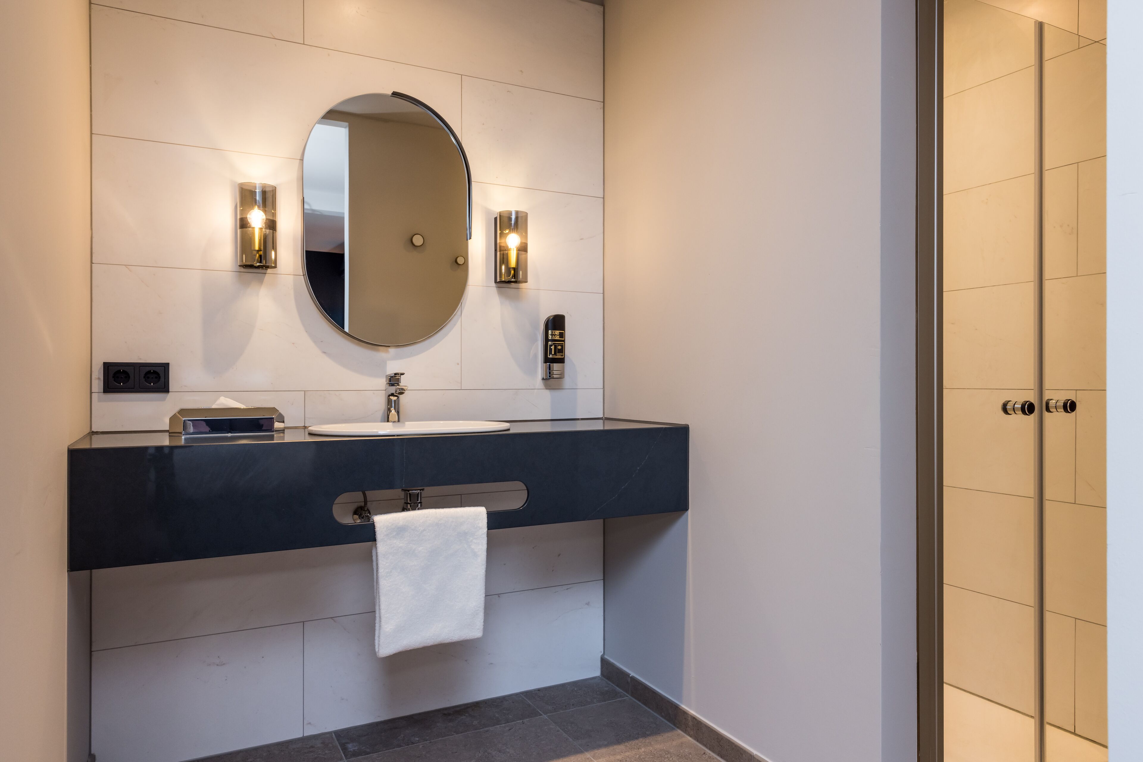 rainfall showerhead, designer toiletries, hair dryer