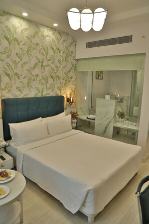 Ropa de cama de alta calidad y minibar 