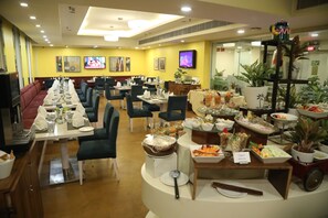 Daily buffet breakfast (INR 350 per person) - Sarovar Portico Naraina Delhi (New Delhi)