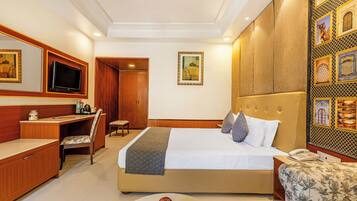 Minibar, desk, laptop workspace, iron/ironing board