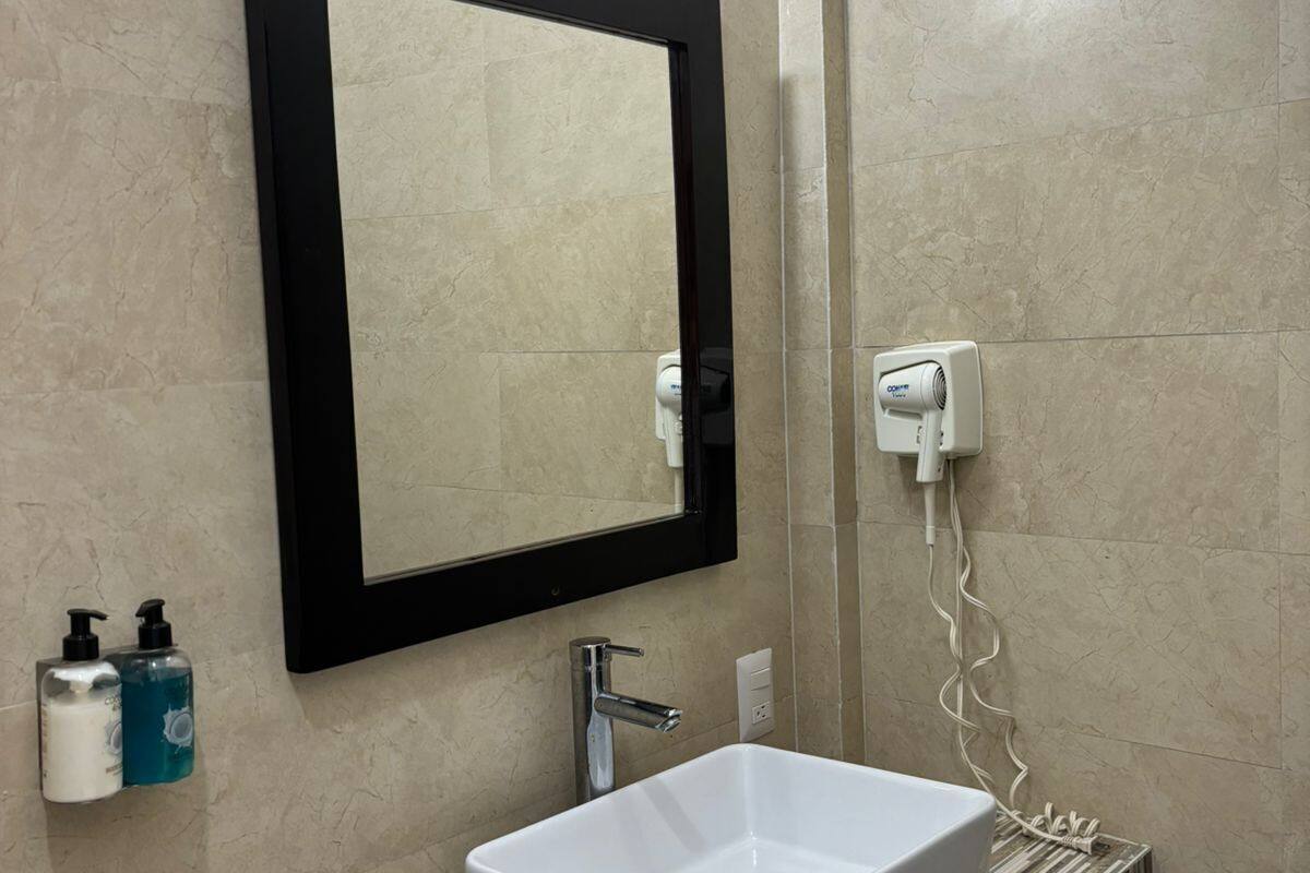 shower, rainfall showerhead, designer toiletries, hair dryer