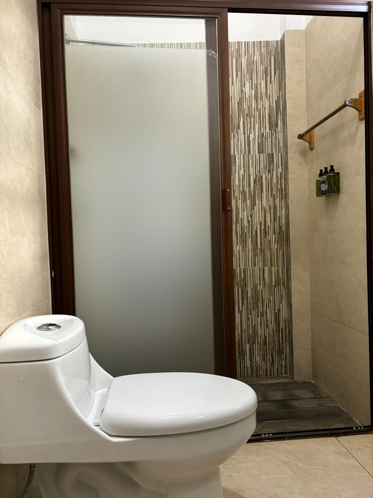 shower, rainfall showerhead, designer toiletries, hair dryer