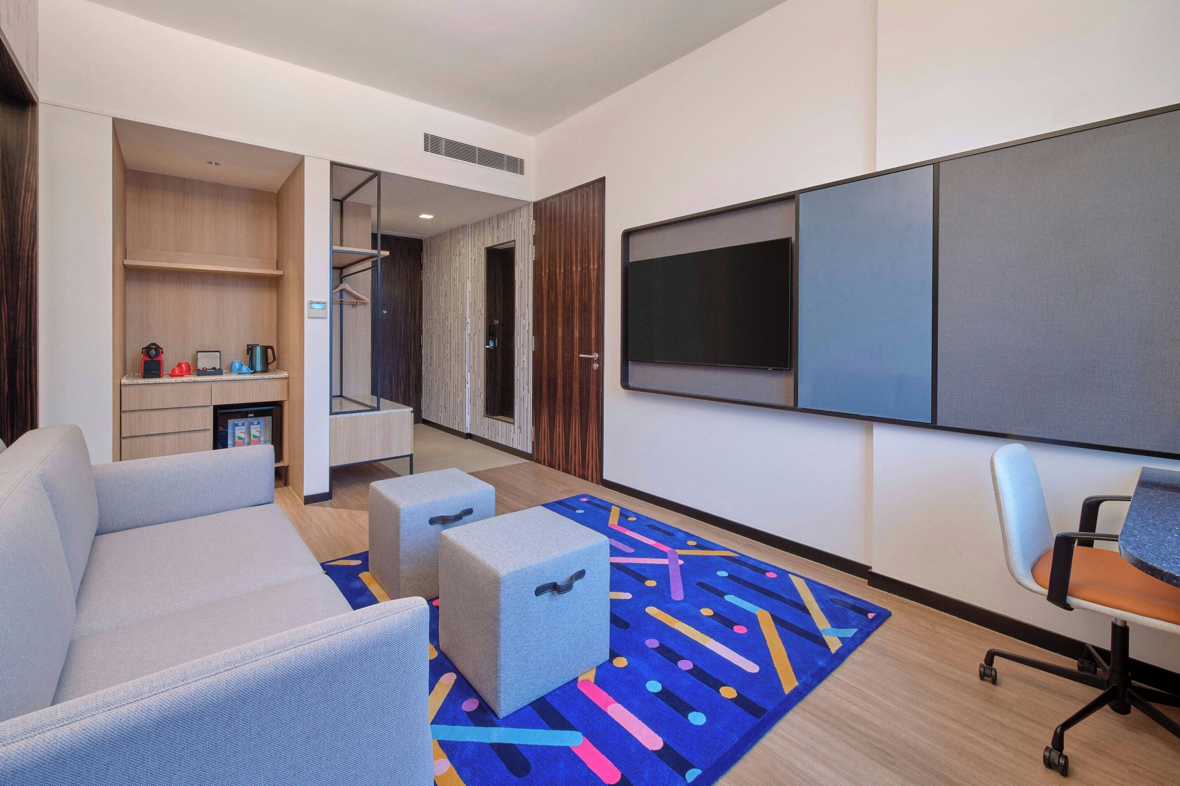 suite, 1 bedroom, non smoking | living area | 55-inch lcd tv with cable channels, tv