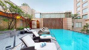 Outdoor pool, pool umbrellas, pool loungers