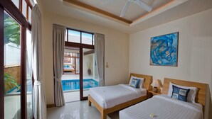 A hotel room with two beds, a large window, a painting, and a view of a pool. - Samui Boat Lagoon (Koh Samui)
