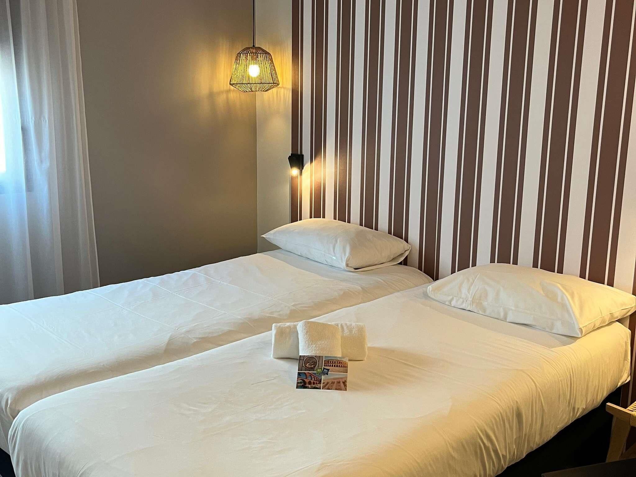 Standard Room, 2 Single Beds | In-room safe, soundproofing, iron/ironing board, free cots/infant beds