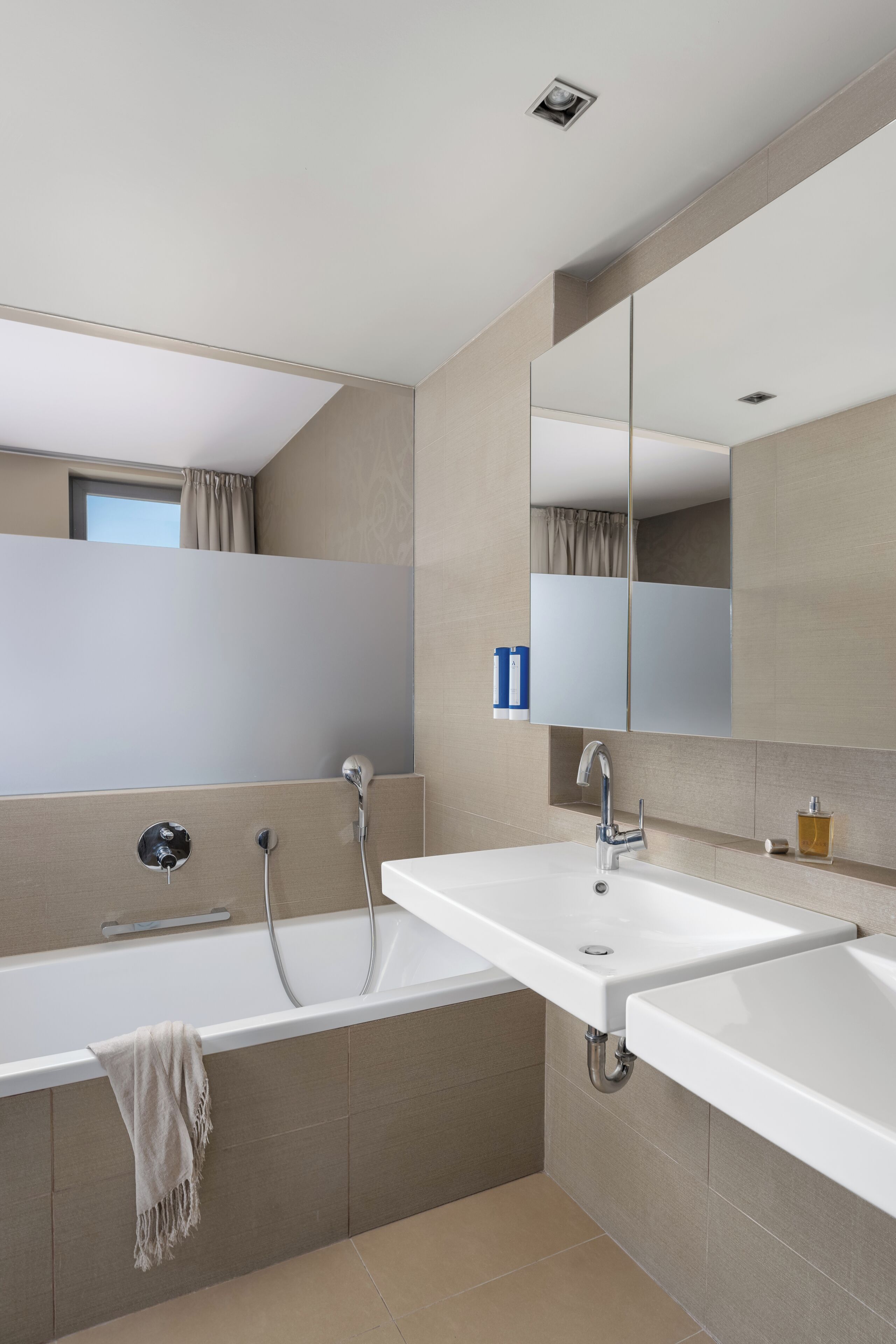 junior suite | bathroom | rainfall showerhead, free toiletries, hair dryer, towels