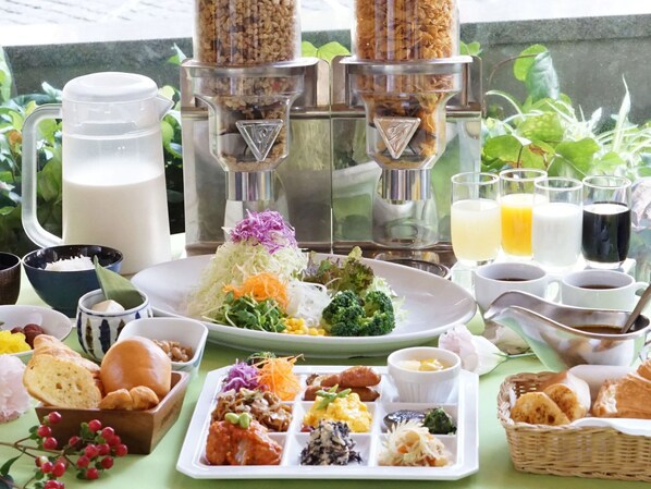 A breakfast buffet with various dishes, beverages, and a coffee machine. - Hotel Awina Osaka (Osaka)