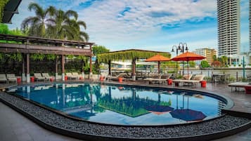 Outdoor pool, open 6:00 AM to 9:00 PM, pool umbrellas, pool loungers