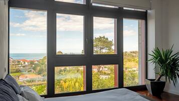 Habitación cuádruple familiar | Ropa de cama de alta calidad, minibar y decoración personalizada