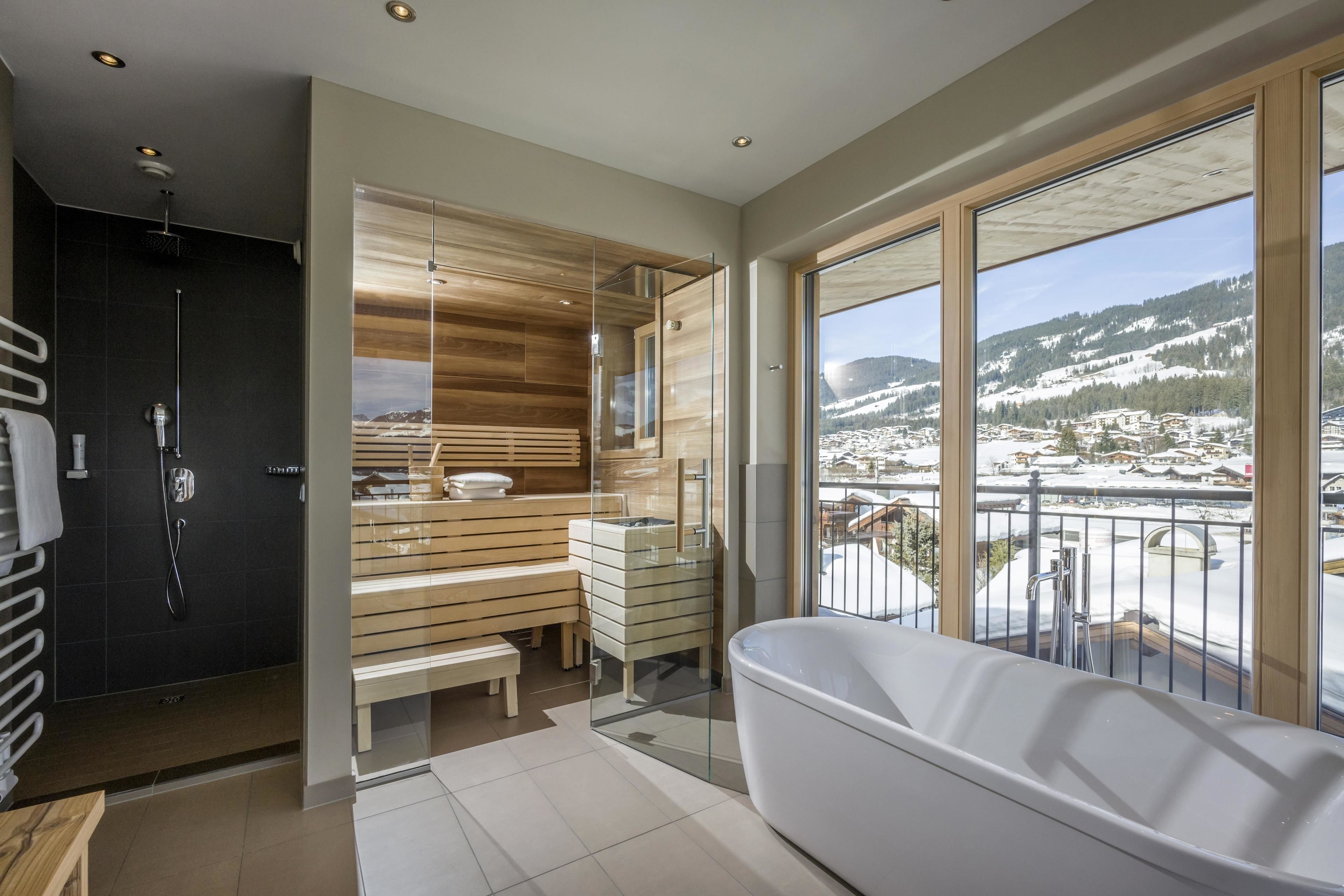 panoramic suite, 1 king bed with sofa bed, sauna, mountain view | bathroom | shower, rainfall showerhead, free toiletries, hair dryer