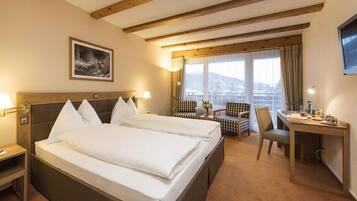 Hypo-allergenic bedding, free minibar, in-room safe, desk
