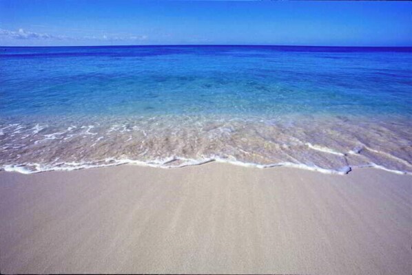 Private beach, beach umbrellas, beach towels
