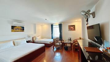 Deluxe Suite Triple | Minibar, in-room safe, iron/ironing board, free WiFi