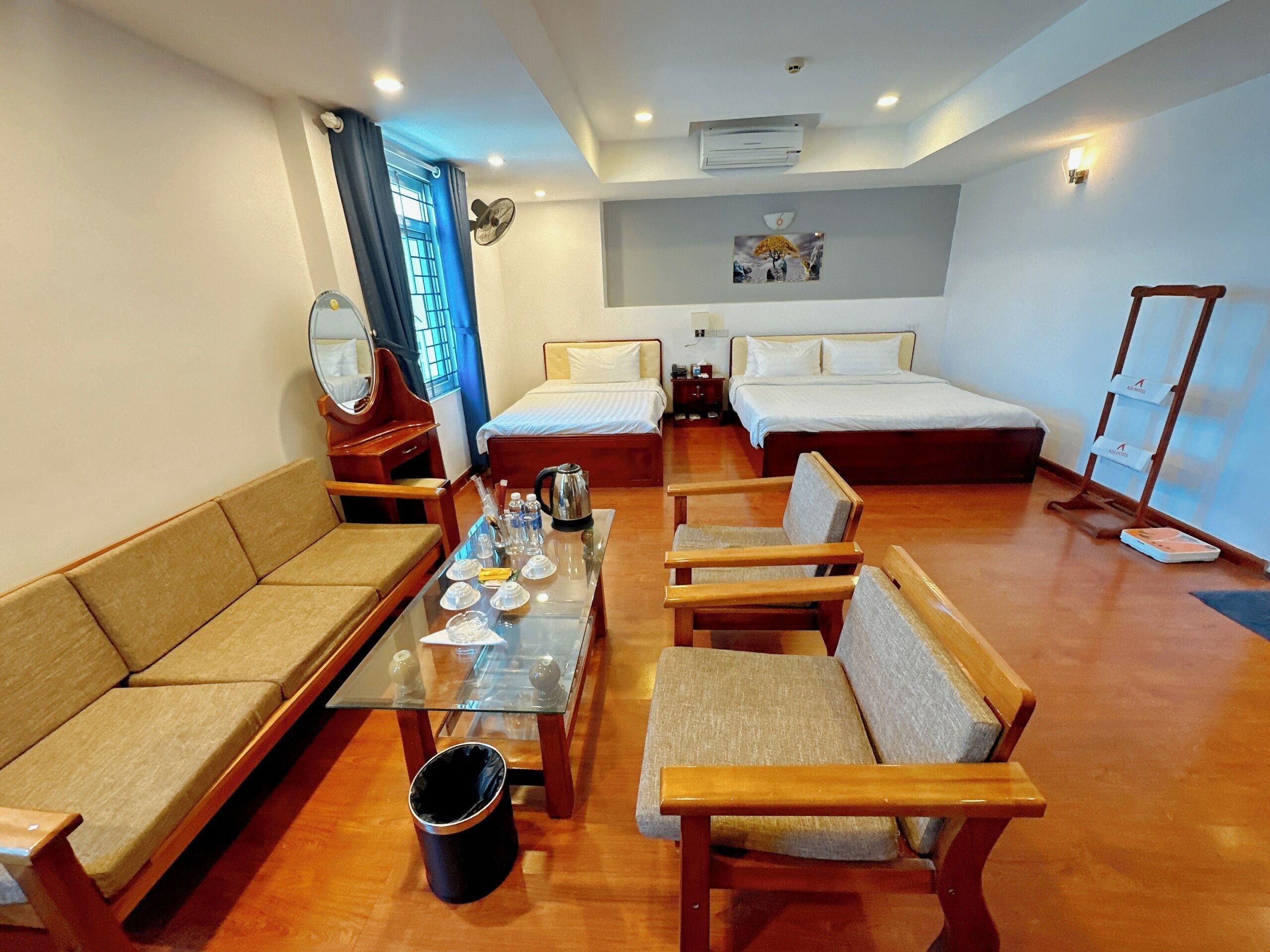 Deluxe Suite Triple | Minibar, in-room safe, iron/ironing board, free WiFi