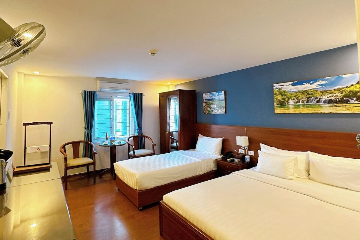 Family Twin Room | Minibar, in-room safe, iron/ironing board, free WiFi