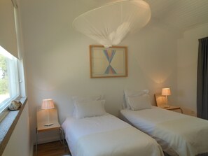 Doppel- oder Zweibettzimmer