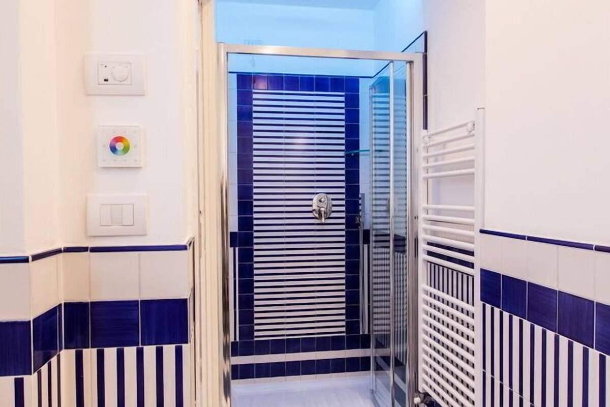 standard double room, pool view | bathroom | shower, rainfall showerhead, hair dryer, bathrobes