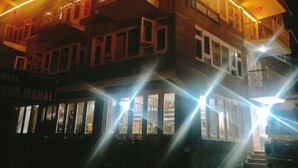 A multi-story building with balconies and a sign that reads "NOOR MAHAL". - Hotel Noor Mahal (Anantnag)