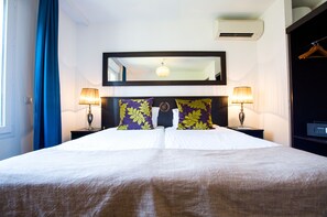 Habitación superior | Sistema de insonorización, wifi gratis, ropa de cama