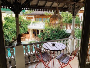 Suíte estúdio luxo, 1 quarto, vista parcial para o oceano | Vista para o jardim