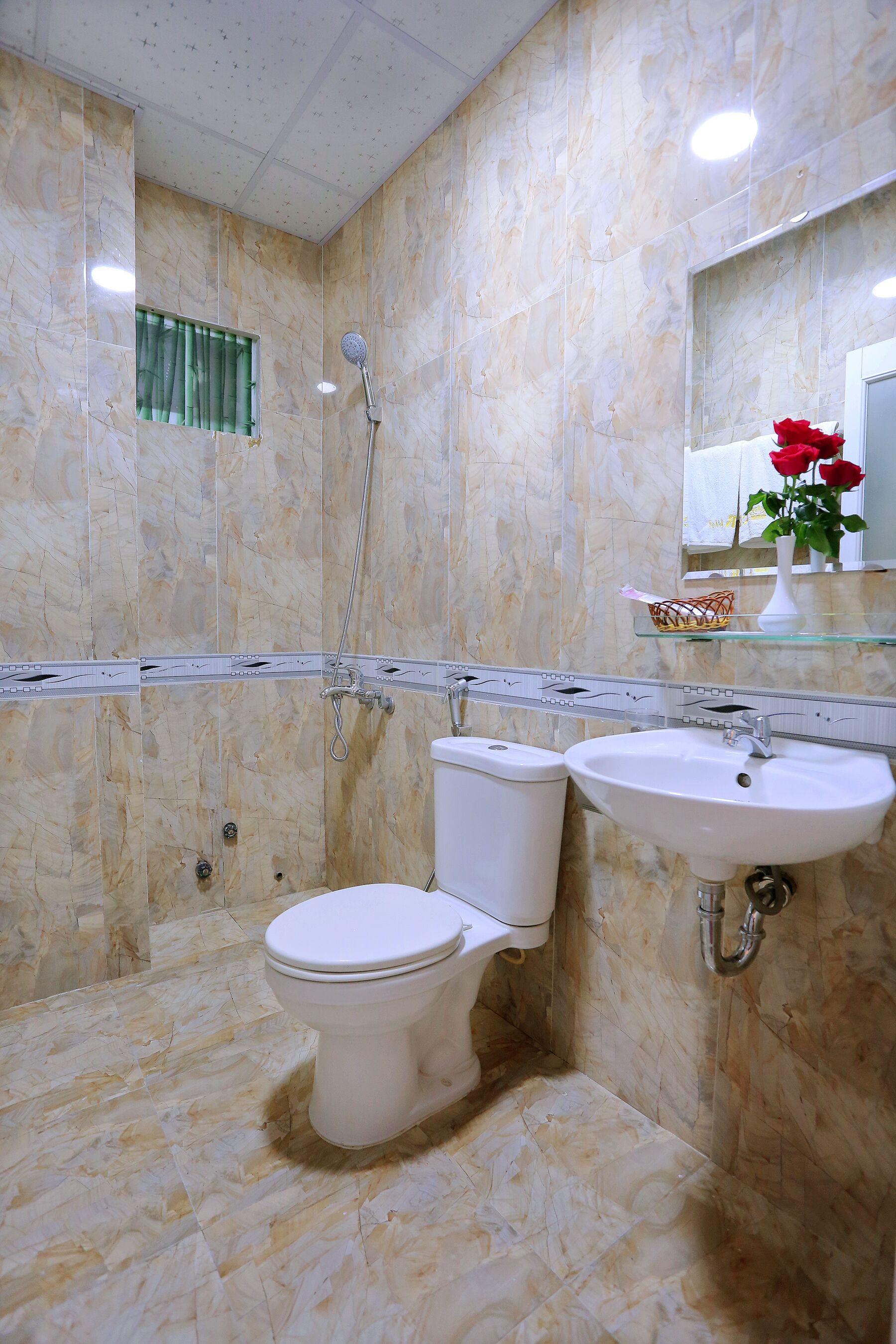 deluxe room, 2 double beds | bathroom sink