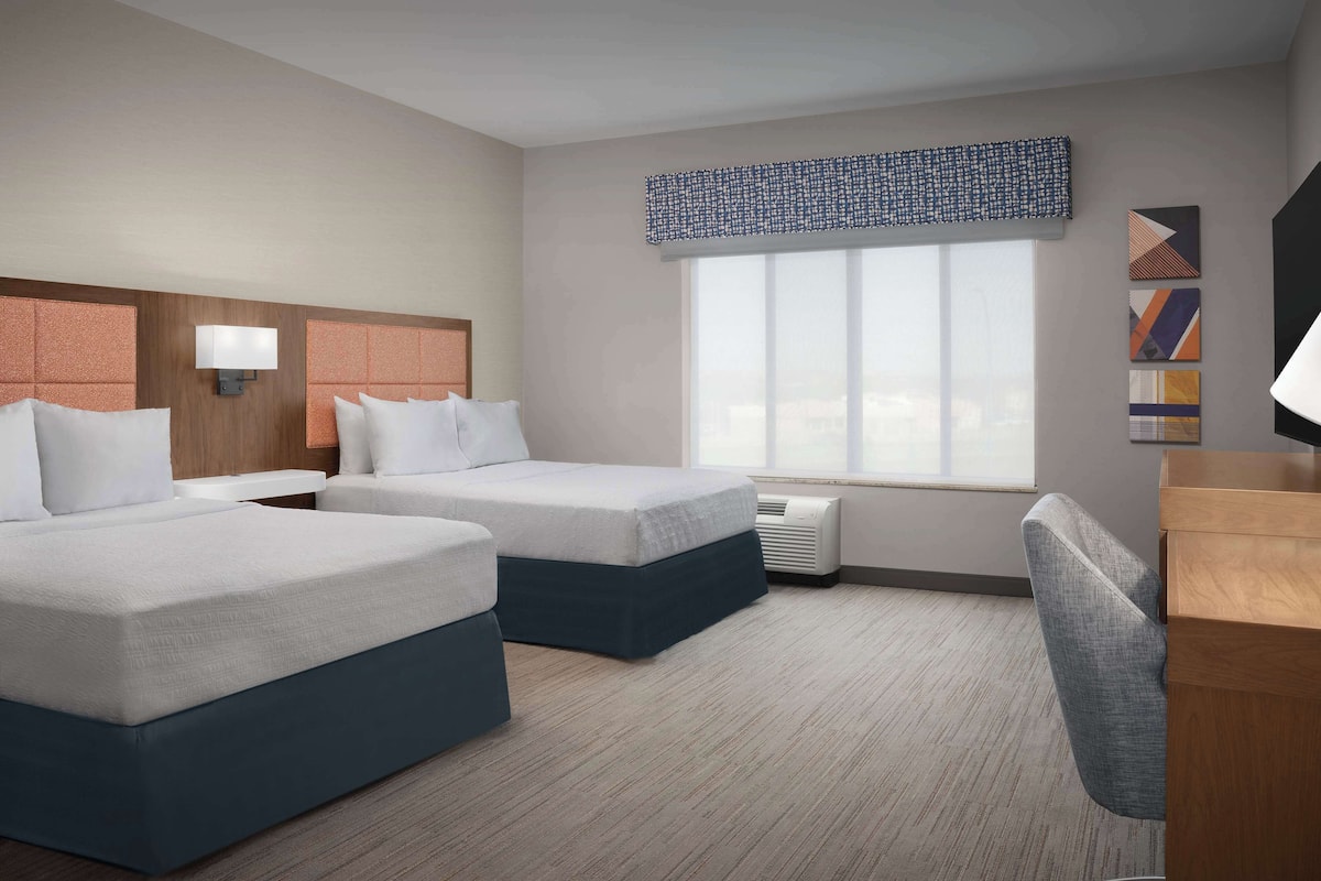 Down duvets, pillow-top beds, desk, laptop workspace