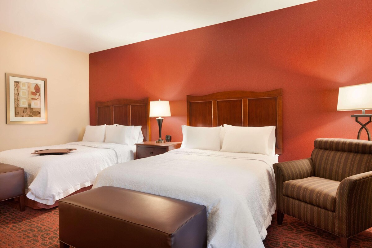 Down comforters, pillowtop beds, desk, laptop workspace