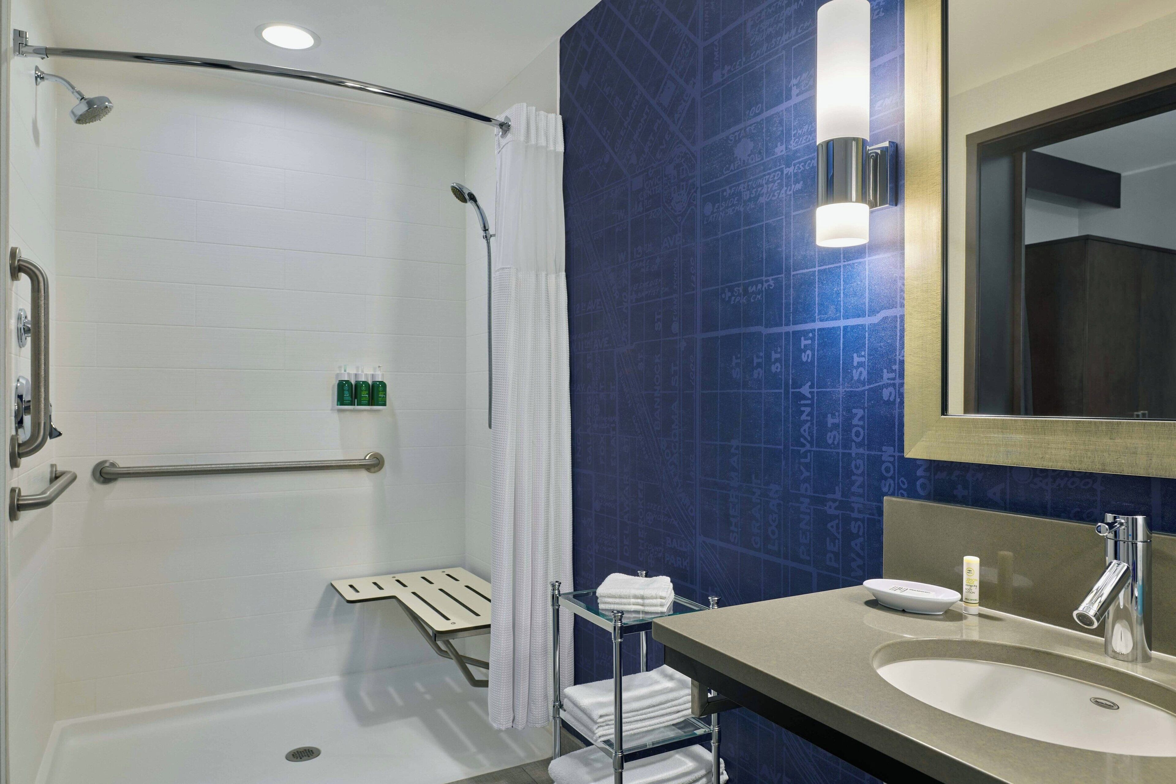 hydromassage showerhead, free toiletries, hair dryer, towels