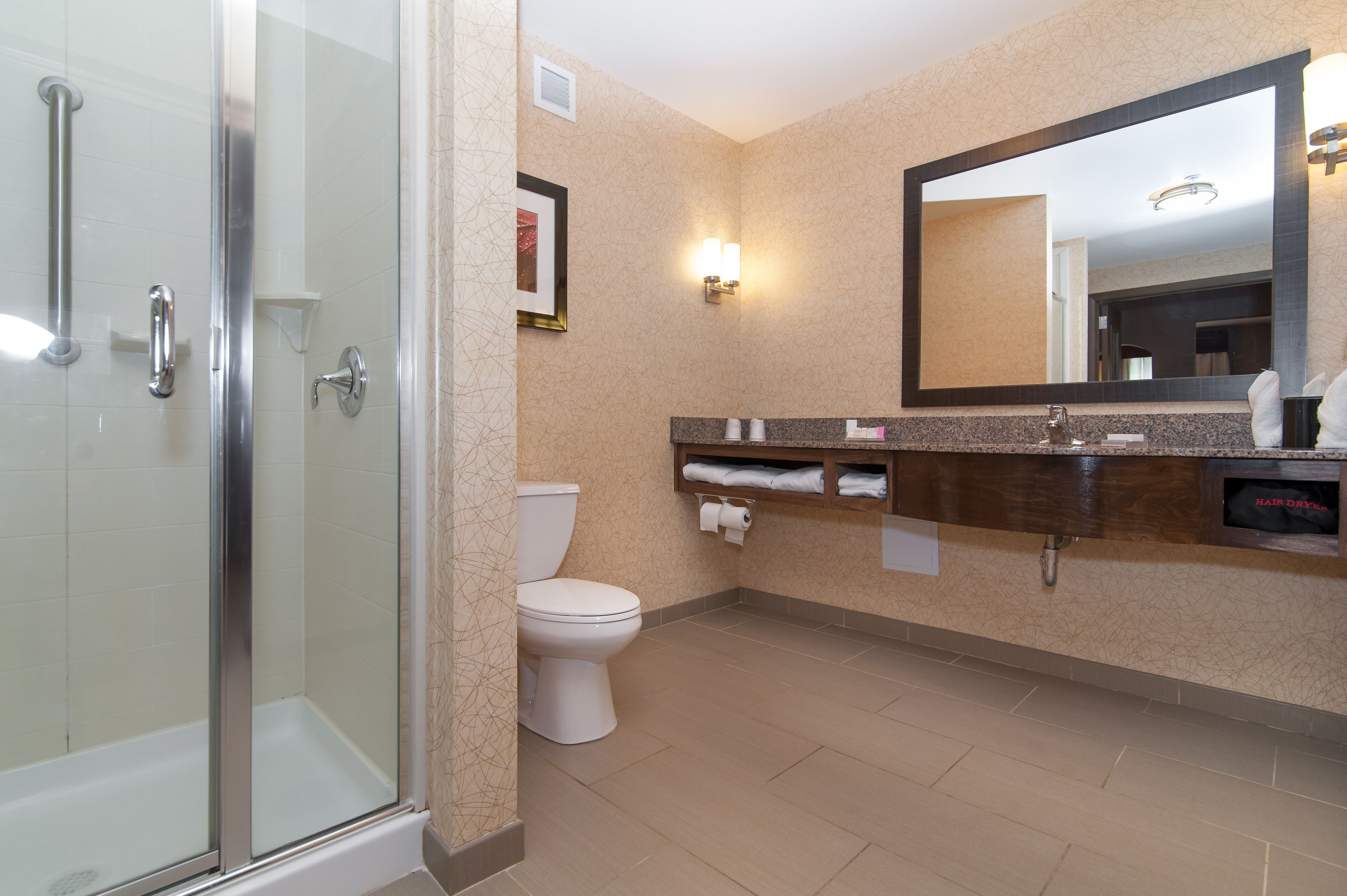 king bed with whirlpool | bathroom | free toiletries, hair dryer, towels, soap