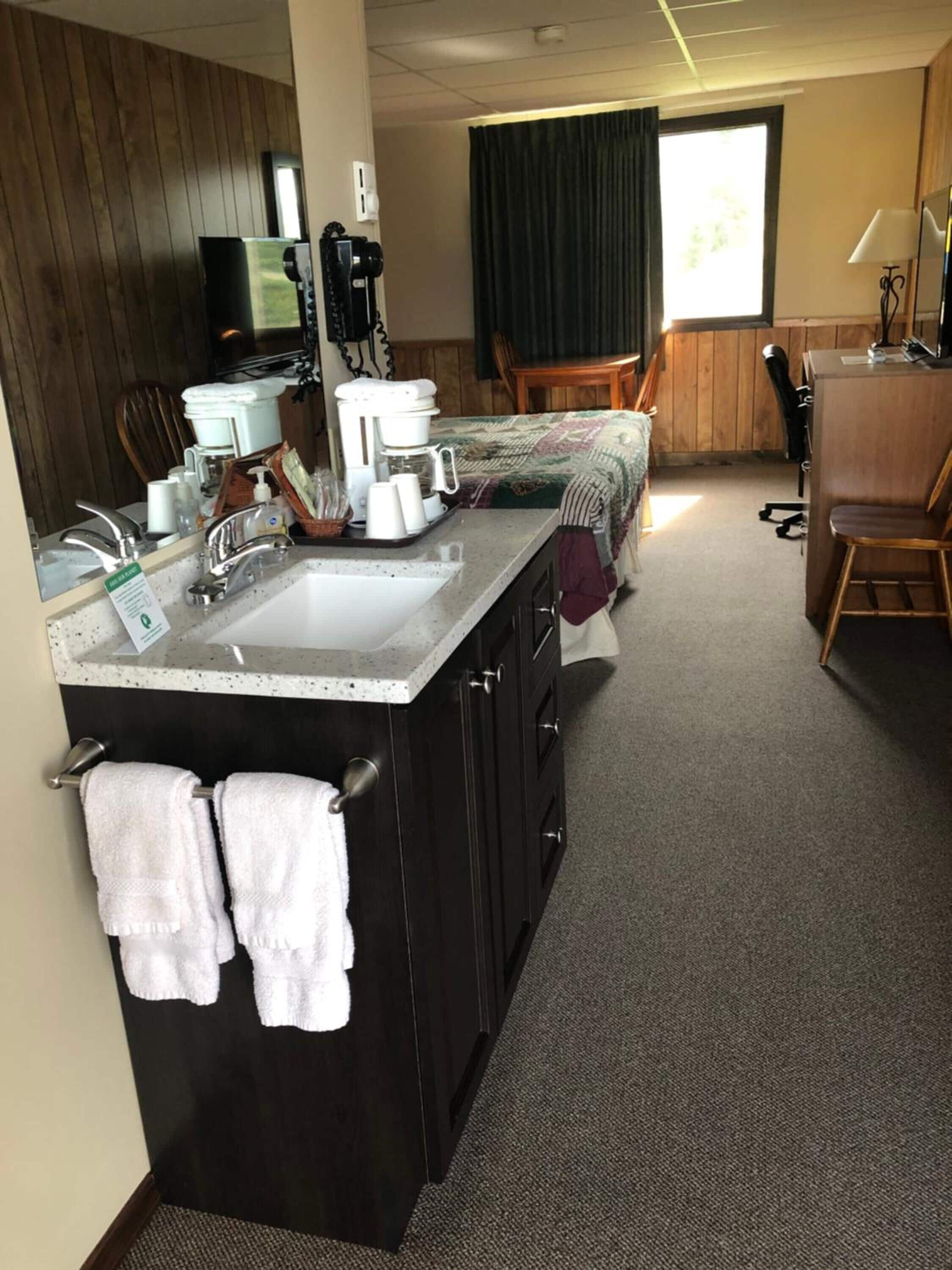Desk, blackout curtains, free WiFi, bed sheets