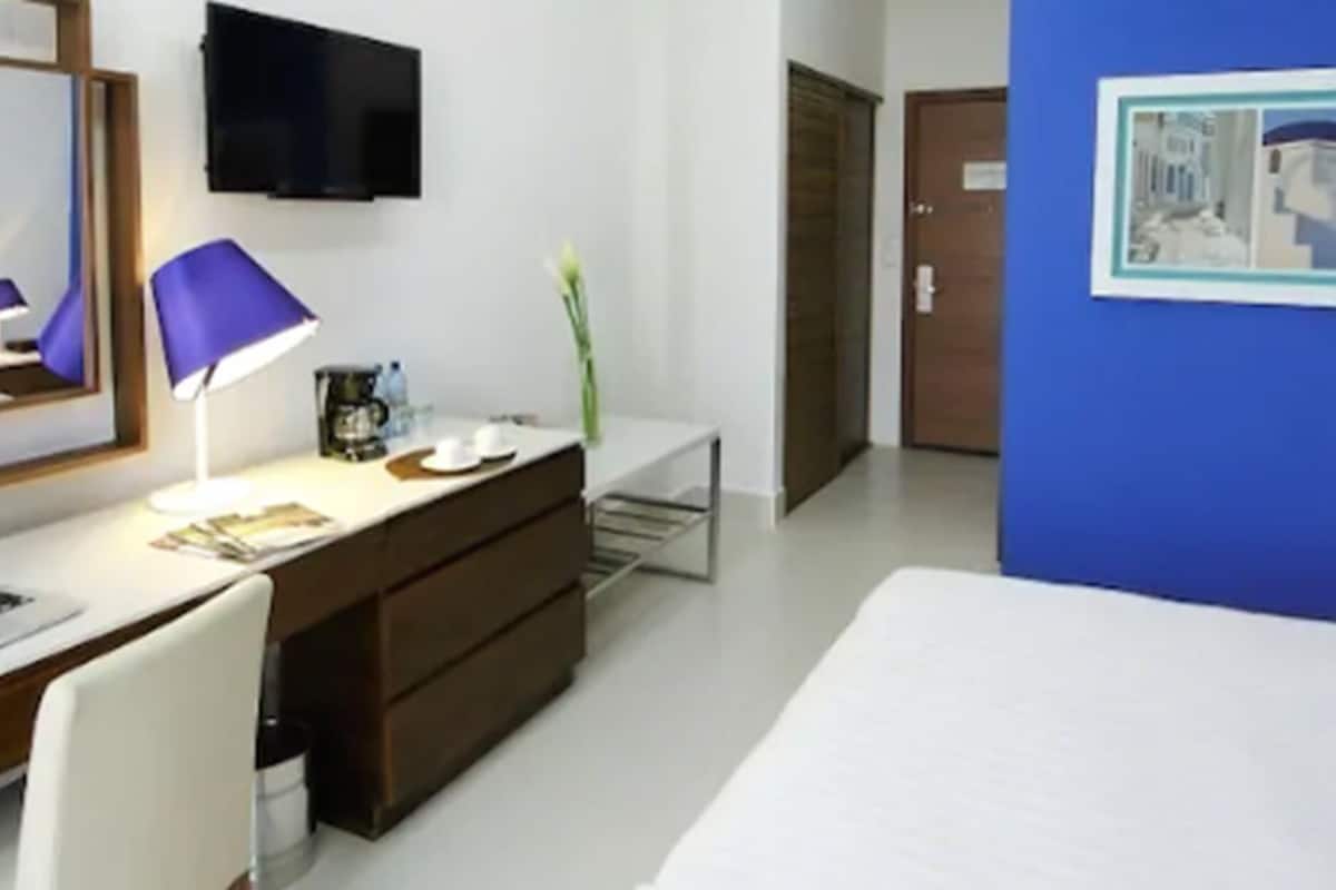 in-room safe, desk, blackout curtains, iron/ironing board