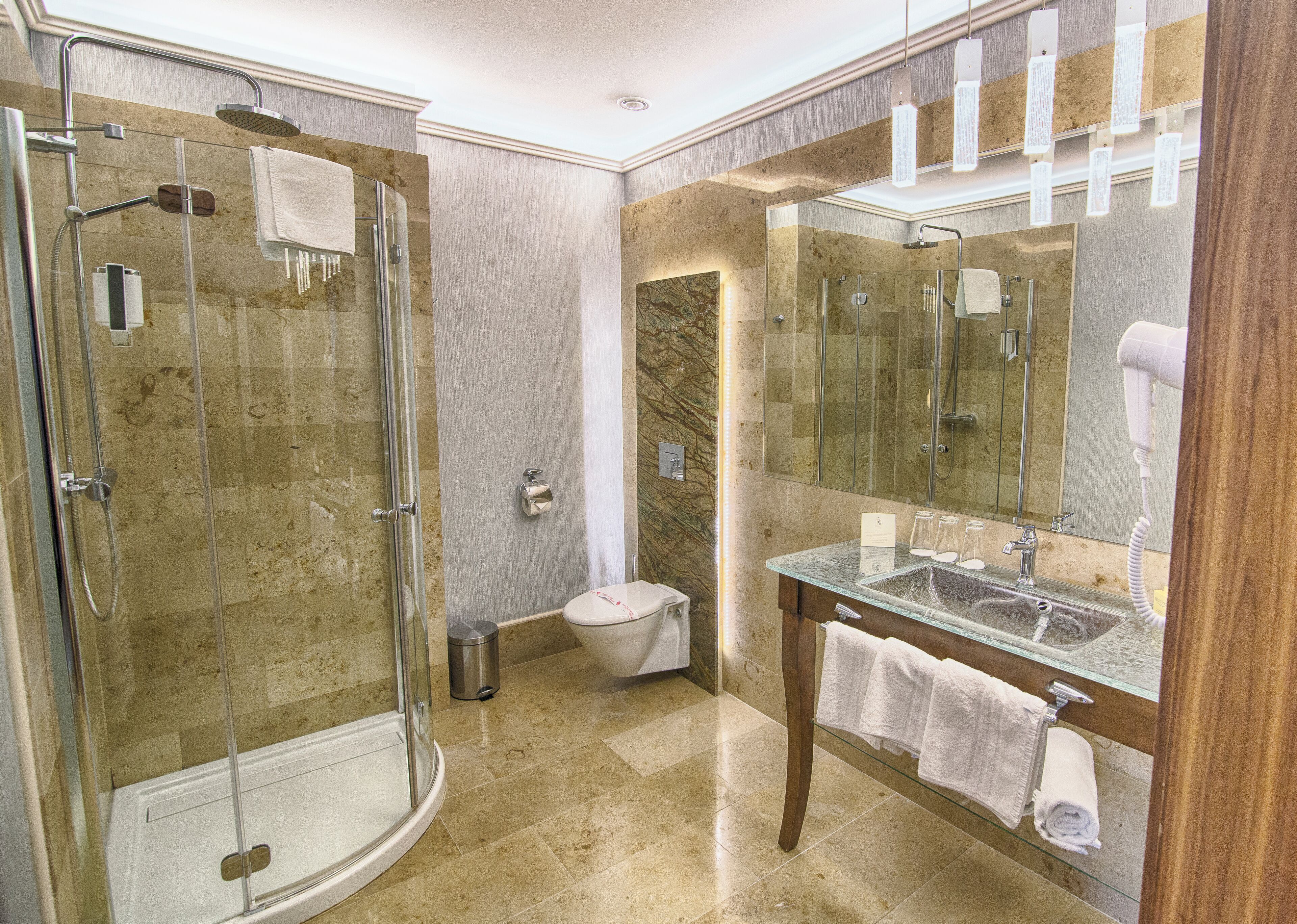 rainfall showerhead, free toiletries, hair dryer, slippers