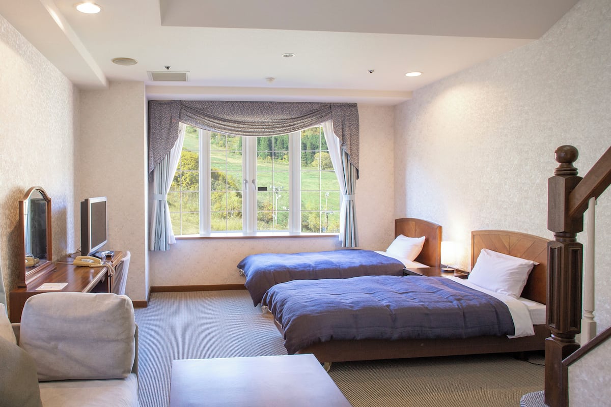 Kamer, niet-roken, uitzicht op bergen (Cortina Maisonette) | Een kluis op de kamer, gratis wifi, beddengoed