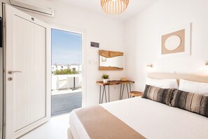 Habitación básica con 1 cama matrimonial o 2 individuales | Ropa de cama de alta calidad, camas con pillow-top y minibar 