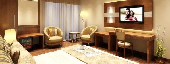 Deluxe Room | Down comforters, individually decorated, individually furnished, desk