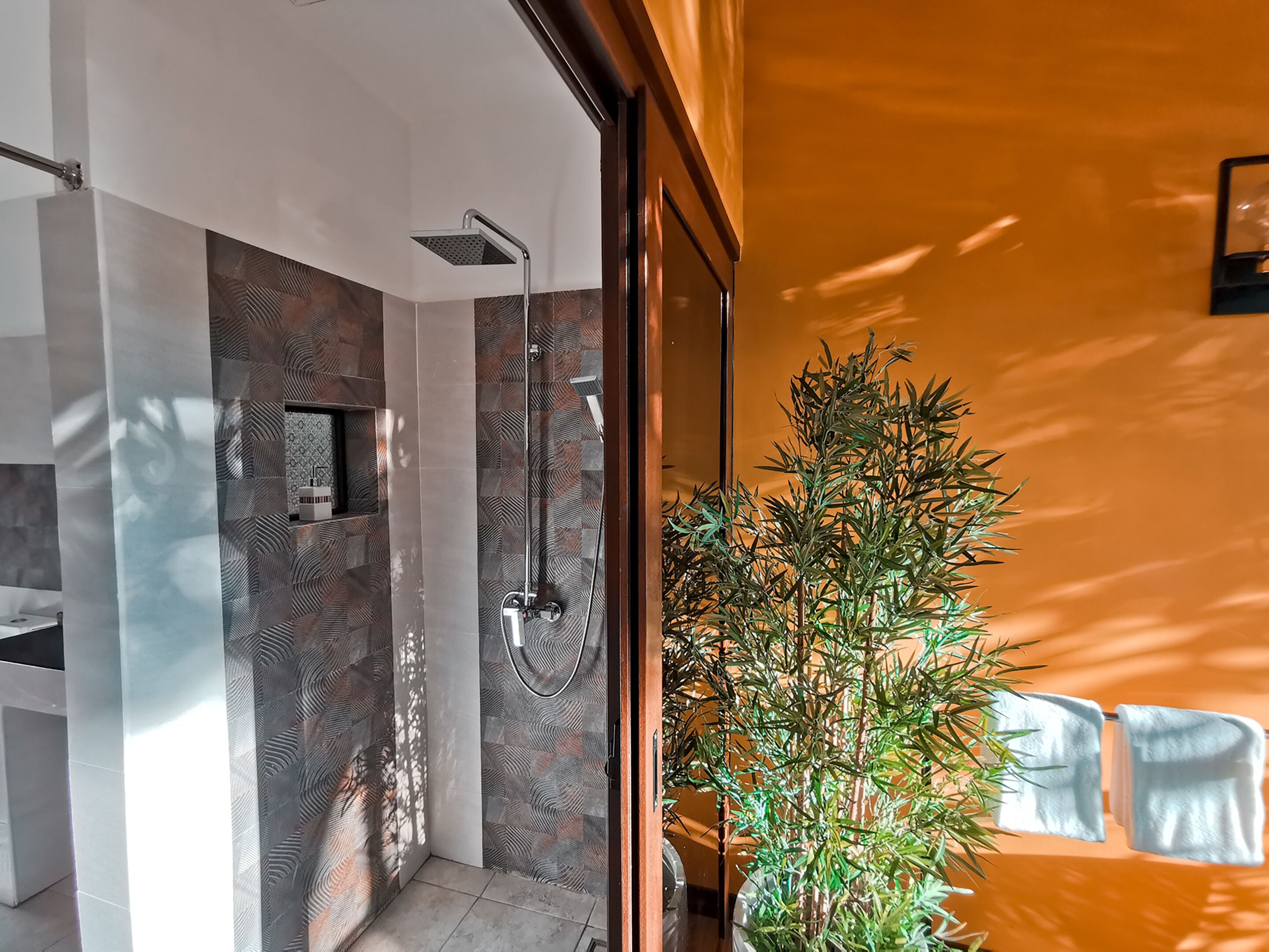 premier room, river view | bathroom | free toiletries, hair dryer, slippers, bidet