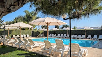 Outdoor pool, pool umbrellas, pool loungers