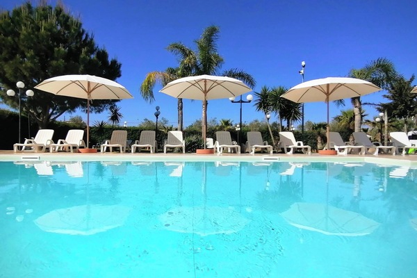 Seasonal outdoor pool, pool umbrellas, pool loungers