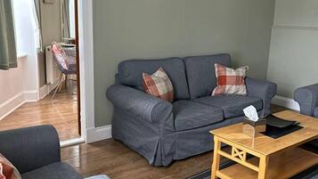 Traditional Cottage, 1 King Bed (no pets) | Living area | Smart TV, toys